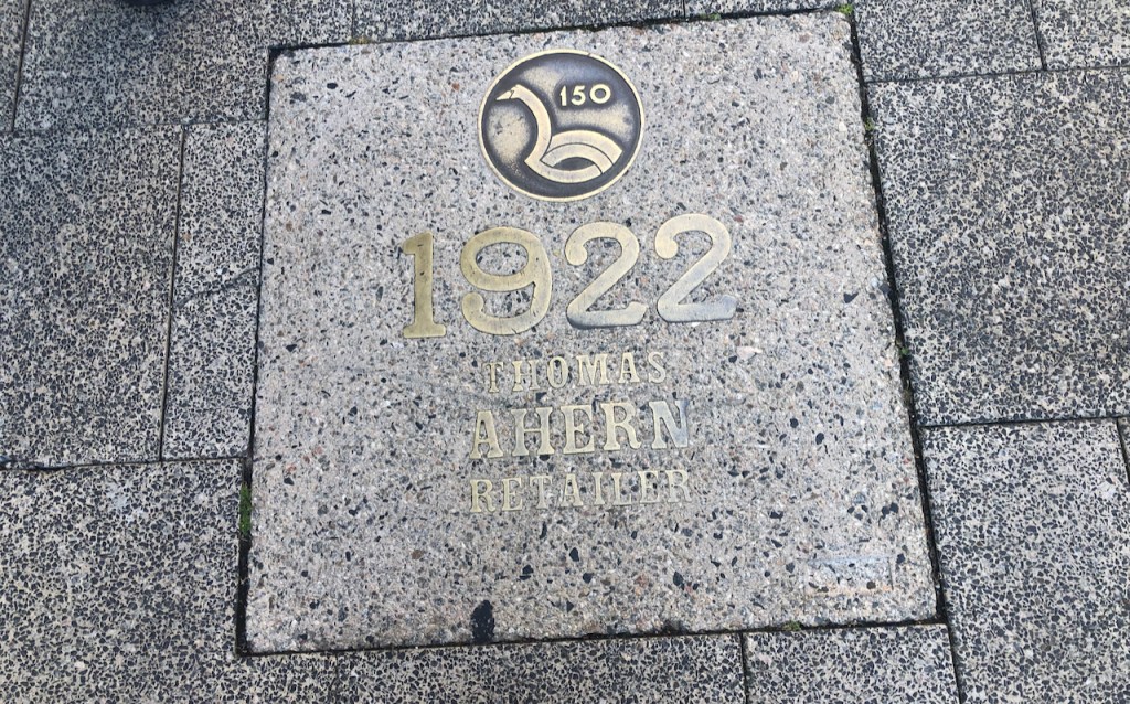 Brick paving block with the inscription 1922, Thomas Ahern, Retailer